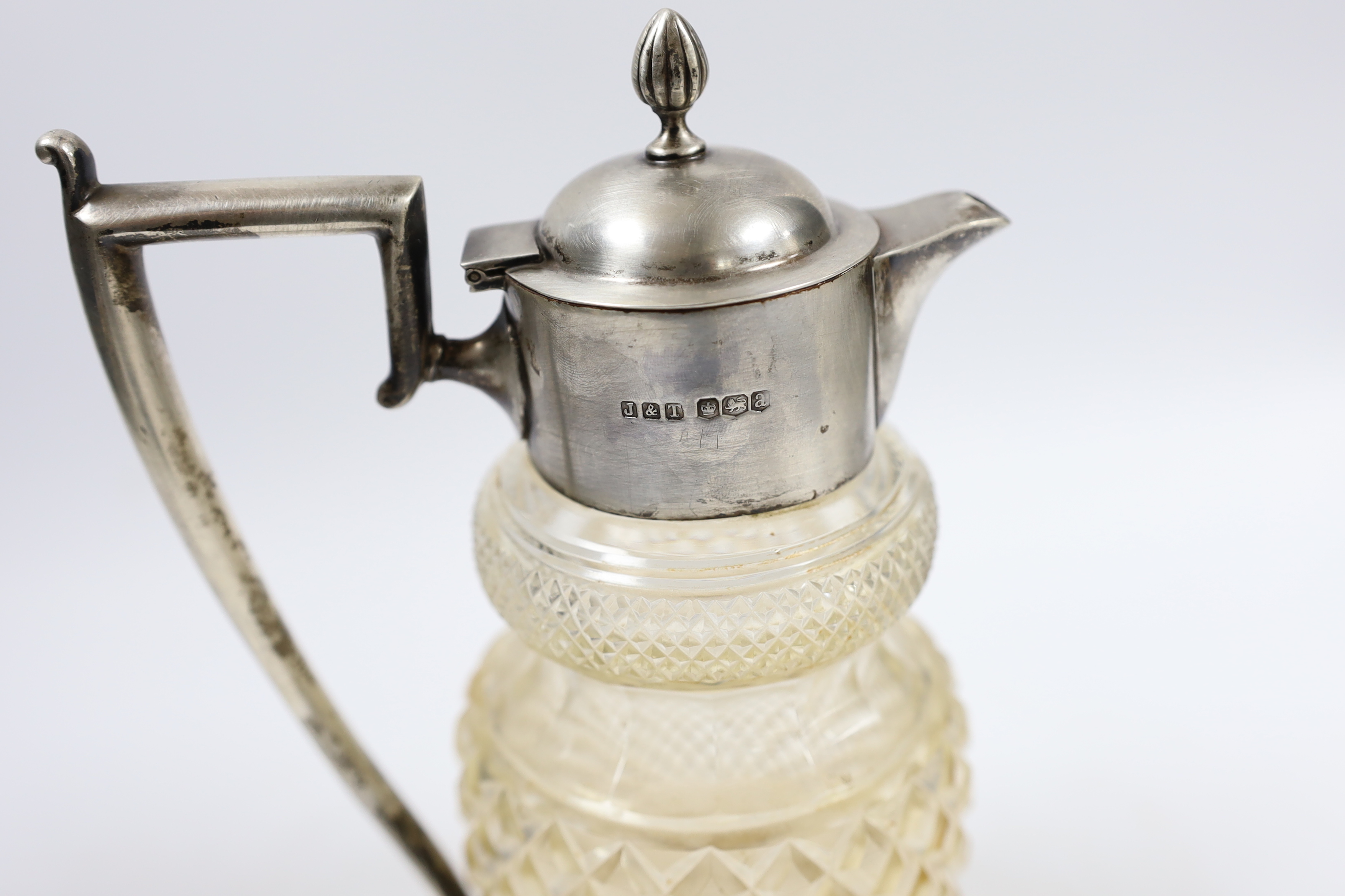 A George V silver mounted cut glass claret jug, Jenkins & Timm, Sheffield, 1918, height 21.7cm.